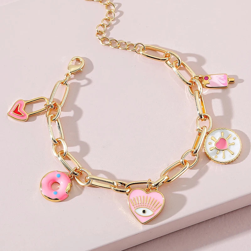 Schattige Roze & Paarse Bedelarmband | Donut, IJsje, Hart & Boze Oog Charms