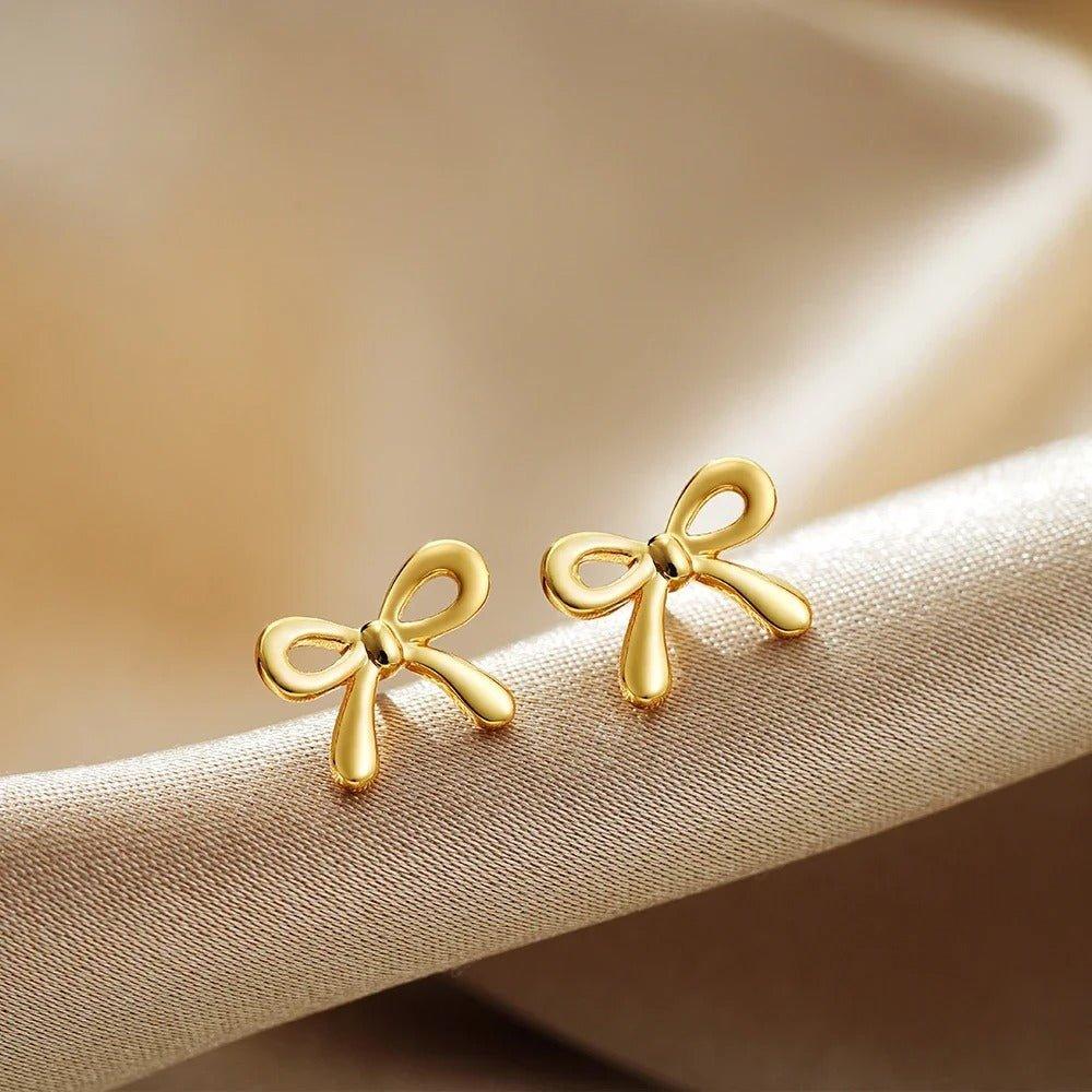 Boucles d'oreilles avec nœud | Or plaqué 14k